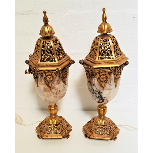 514 - PAIR OF MARBLE AND GILT BRASS LAMPS
raised on pierced hexagonal bases with scroll feet, the shaped h... 