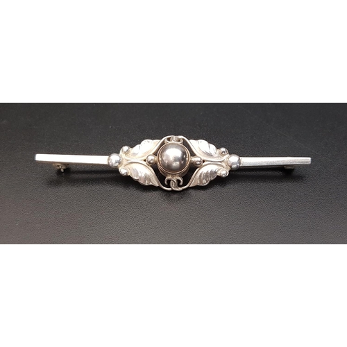 35 - GEORG JENSEN DANISH SILVER BROOCH
pattern number 224B, with a half bead centre and foliate surround,... 