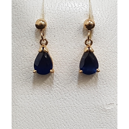 46 - PAIR OF SAPPHIRE DROP EARRINGS
the pear cut sapphires on each approximately 0.5cts, in nine carat go... 