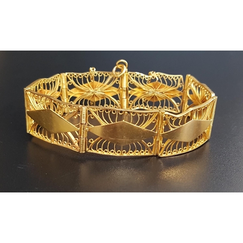 90 - ATTRACTIVE UNMARKED HIGH CARAT GOLD BRACELET
the rectangular links with pierced filigree decoration,... 