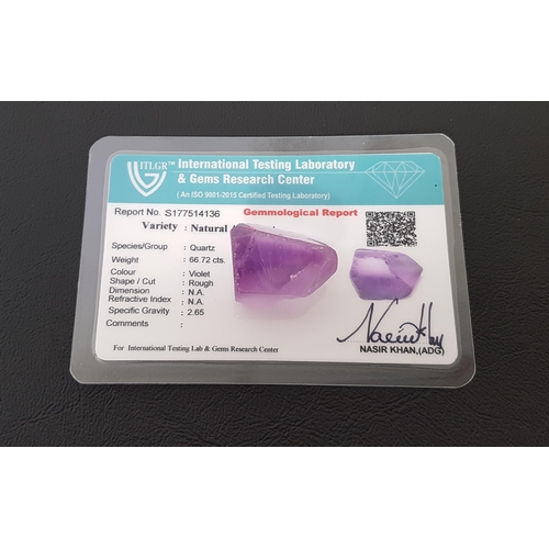 106 - CERTIFIED LOOSE NATURAL AMETHYST
the rough cut amethyst weighing 66.72cts, with ITLGR Gemmological R... 
