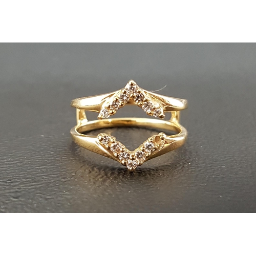 140 - UNUSUAL DIAMOND SET RING
the diamonds in opposing chevron shaped setting around a pierced centre, in... 