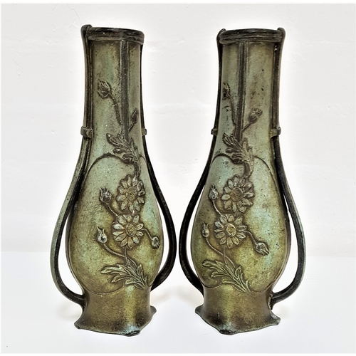 217 - PAIR OF EARLY 20TH CENTURY FRENCH SPELTER VASES
in the Art Nouveau style, cast and decorated with fl... 