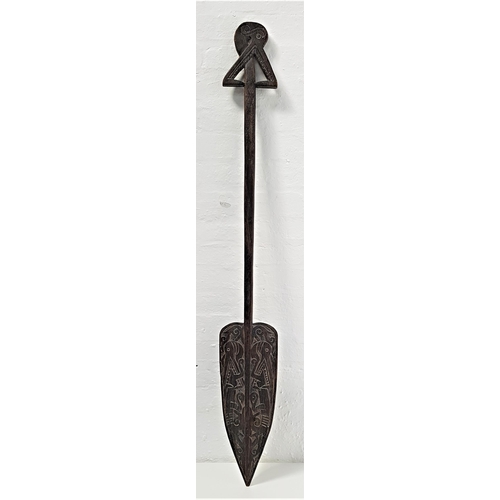 231 - CARVED WOOD INDONESIAN PADDLE
possibly Borneo, the carved handle with lizard eating tale, with shape... 