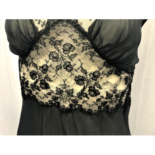 125 - MAE WEST OWNED BLACK LACE NEGLIGEE SET
the set consists of a gown and a robe. The set is made of a b... 