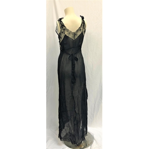 125 - MAE WEST OWNED BLACK LACE NEGLIGEE SET
the set consists of a gown and a robe. The set is made of a b... 