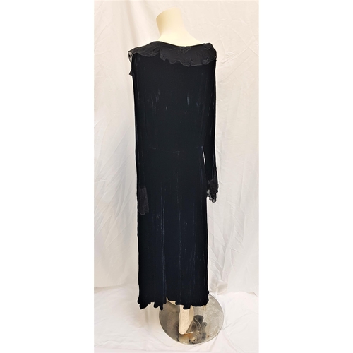 139 - TAI BABILONIA - BLACK VELVET DRESS
by Alexander Brown of Los Angeles, with lace frill to neck and fr... 