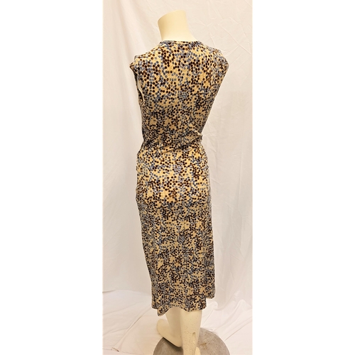 145 - CATHERINE OXENBERG - WRAP AROUND DRESS
by t-bags, size small, accompanied by Star Wares Collectibles... 