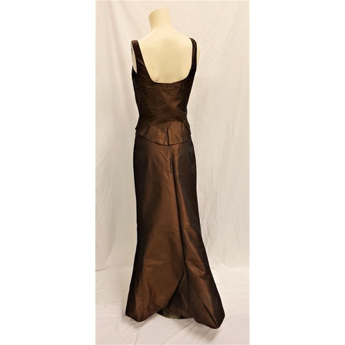 149 - CATHERINE OXENBERG - TWO PIECE COPPER COLOURED OUTFIT
by Menage a Trois, signed to label of skirt. A... 