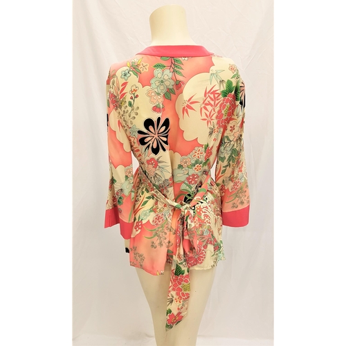 150 - CATHERINE OXENBERG - FLORAL BLOUSE
by Mimi Maternity, size M, with back tie, signed to label. Accomp... 