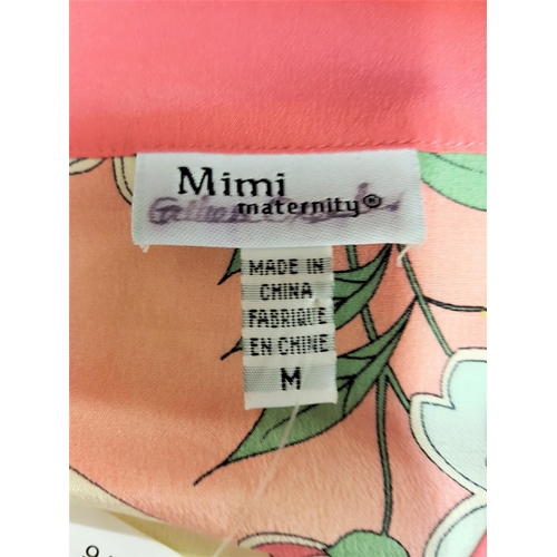 150 - CATHERINE OXENBERG - FLORAL BLOUSE
by Mimi Maternity, size M, with back tie, signed to label. Accomp... 