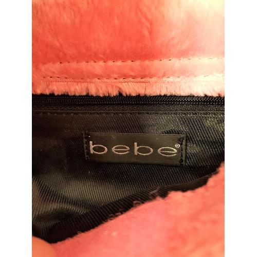 158 - CARMEN ELECTRA - 'BEBE' PINK FAUX FUR PURSE
Accompanied by Star Wares Collectibles certificate of au... 