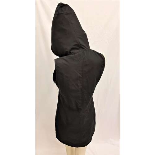 159 - CARMEN ELECTRA - BLACK ZIP FRONT DRESS
with hood, size 10. Accompanied by Star Wares Collectibles ce... 