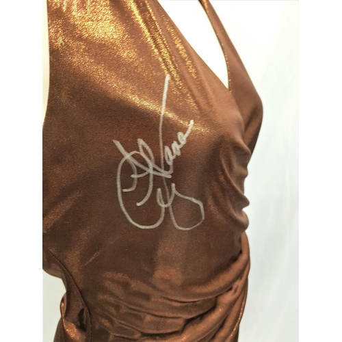 174 - ALANA CURRY - 'RUBY ROX' BROWN SHIMMERING HALTER NECK DRESS
signed to front. Worn by Alana on the Re... 