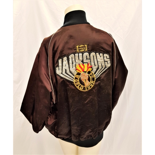 188 - JACKSON'S WORLD TOUR 1984 BROWN TOUR JACKET
with embroidered decoration to reverse