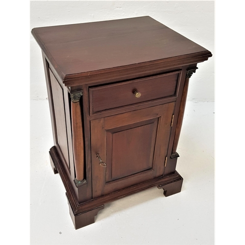 388 - TEAK SIDE CABINET
with a moulded top above a panelled frieze drawer with a panelled cupboard door be... 