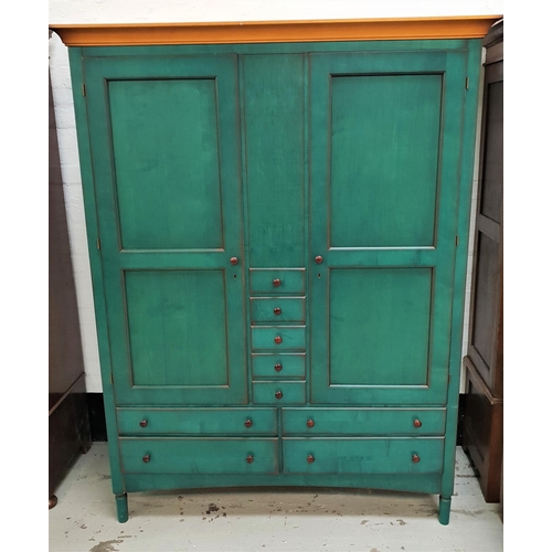 389 - GREEN STAINED WARDROBE
with a moulded top above three central drawers flanked by a pair of panelled ... 