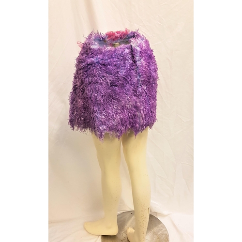 50 - THE FLINTSONES (1994/2000) - PINK AND PURPLE FAUX FUR MINI SKIRT
Pink and purple faux fur mini skirt... 