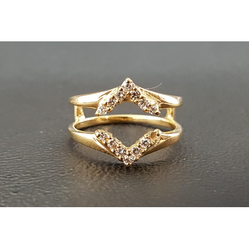 68 - UNUSUAL DIAMOND SET RING
the diamonds in opposing chevron shaped setting around a pierced centre, in... 