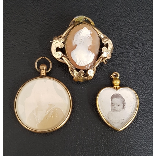 75 - SHELL CAMEO BROOCH
in pinchbeck scroll decorated mount; together with two gold plate mounted double ... 