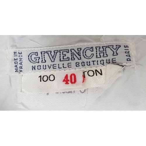 195 - 1960s GIVENCHY NOUVELLE BOUTIQUE SUIT
the white cotton suit comprising a short sleeved jacket and sk... 