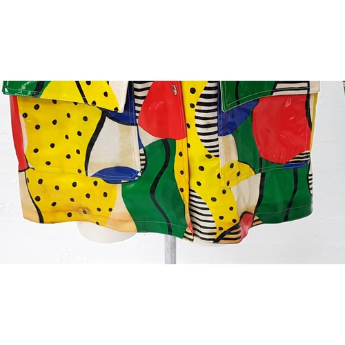 196 - 1960s BRIGHTLY COLOURED RAIN COAT
in blue, yellow, red and green irregular pattern, with two front p... 