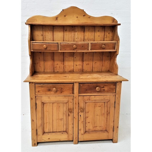 380 - WAXED PINE DRESSER
with shaped top and sides, with two shelves and three drawers above a base with t... 