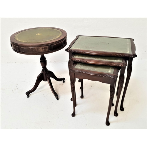 413 - MAHOGANY DRUM TOP OCCASIONAL TABLE
with an inset green leather top above three frieze drawers, on a ... 