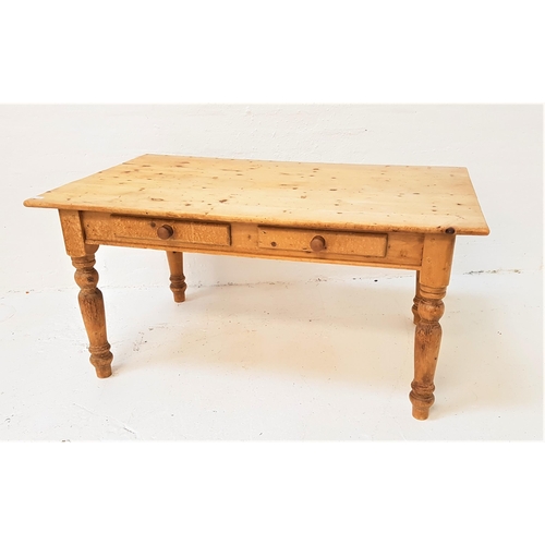 379 - WAXED PINE FARMHOUSE TABLE
with a plain top above two frieze drawers, standing on turned supports, 1... 