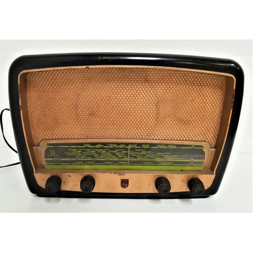 249 - VINTAGE PHILIPS GRAM RADIO
in a shaped bakelite case with a speaker above a clear plastic tuning dia... 