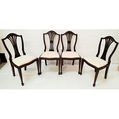 425 - SET OF FOUR MAHOGANY DINING CHAIRS
with wheatsheaf splat backs above shaped drop in seats, standing ... 