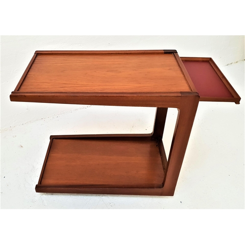 426 - REMPLOY TEAK TRAY TABLE
the floating top with a pull out shelf, on two supporting arms with an under... 