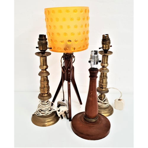 266 - RETRO TEAK TABLE LAMP
raised on a tripod base with a plastic orange shade with raised dimple decorat... 