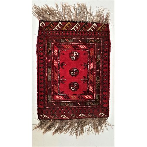 372 - AFGHAN SMALL RUG
the deep red ground with a central panel with three orbs, encased by a panel border... 