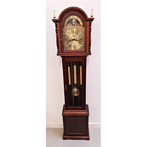 422 - BILLI B MAHOGANY GRANDMOTHER CLOCK
the arched hood with a pair of brass finials, the arched brass di... 