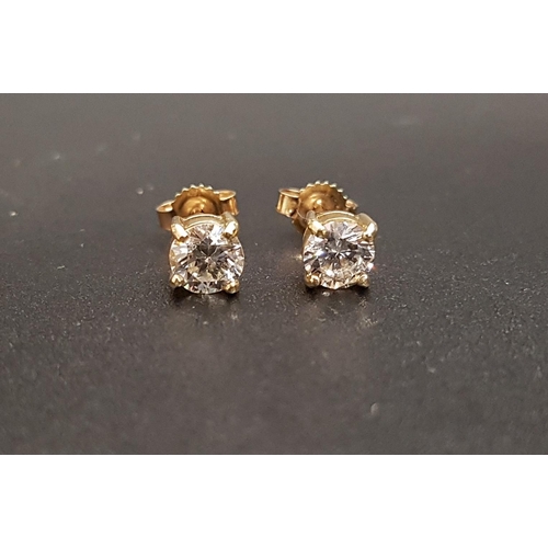 64 - PAIR OF DIAMOND SOLITAIRE EARRINGS
the round brilliant cut diamonds totaling approximately 0.9cts, i... 