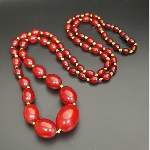 78 - GRADUATED AMBER BEAD NECKLACE
with individually knotted beads, approximately 100cm long and 58.2 gra... 