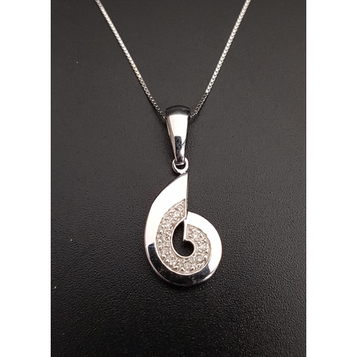 81 - DIAMOND SET NINE CARAT WHITE GOLD PENDANT
of spiral form, approximately 2.7cm high including suspens... 