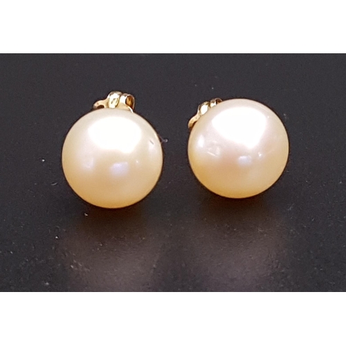 89 - PAIR OF PEARL STUD EARRINGS
in fourteen carat gold