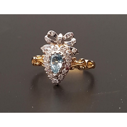 97 - UNUSUAL BLUE TOPAZ AND DIAMOND CLUSTER RING
the pear cut topaz in diamond surround and surmounted by... 