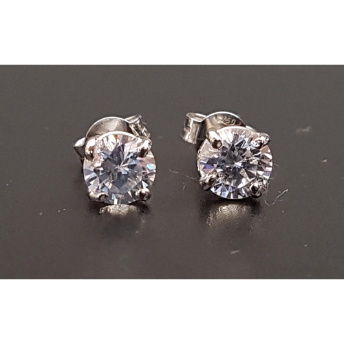 111 - PAIR OF CZ STUD EARRINGS
each CZ approximately 0.85cts, in unmarked gold, the butterflies marked '75... 