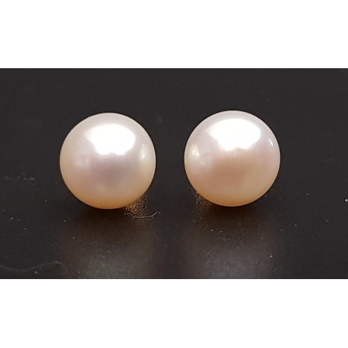 112 - PAIR OF PEARL STUD EARRINGS
in ten carat gold