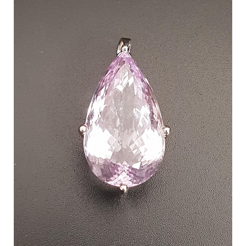 116 - LARGE KUNZITE SINGLE STONE PENDANT
the Portuguese pear cut gemstone measuring approximately 26mm x 1... 