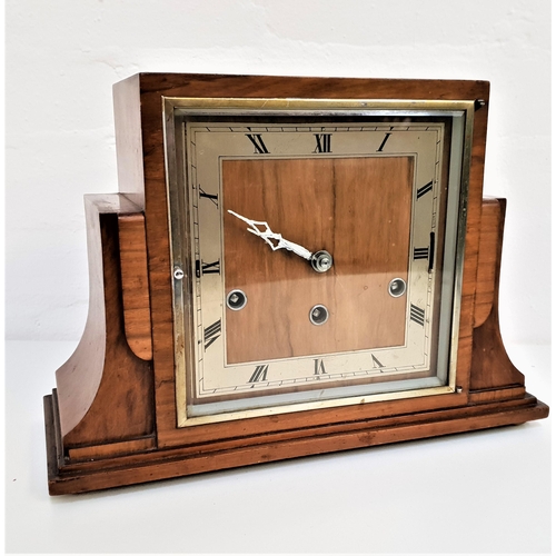 275 - 1930s WALNUT CASED MANTLE CLOCK
with a Westminster chime and a silvered square dial with Roman numer... 