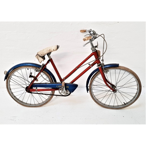 298 - RALEIGH RODEO GIRLS BICYCLE
with a red tubular frame, blue mud and chain guard