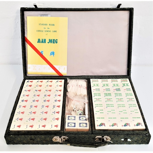 306 - MAH JONG SET
in a fitted case with rule book, new and unused