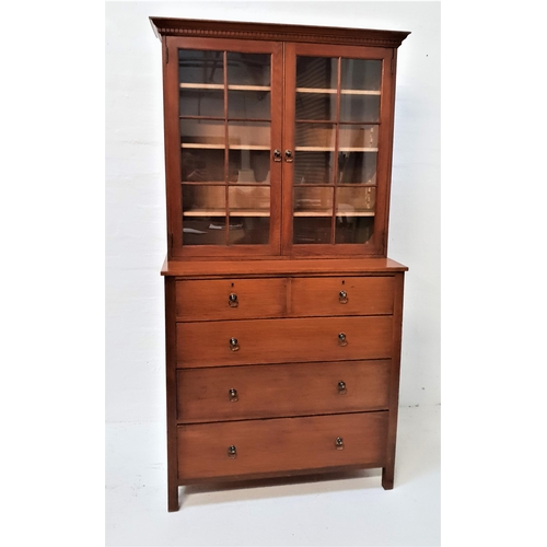 419 - OAK BOOKCASE ON CHEST
with a moulded dentil cornice above a pair of glass panelled doors opening to ... 