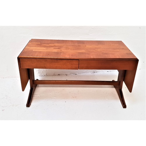 423 - MCINTOSH TEAK OCCASIONAL TABLE
with an oblong top with drop flaps above two frieze drawers, standing... 