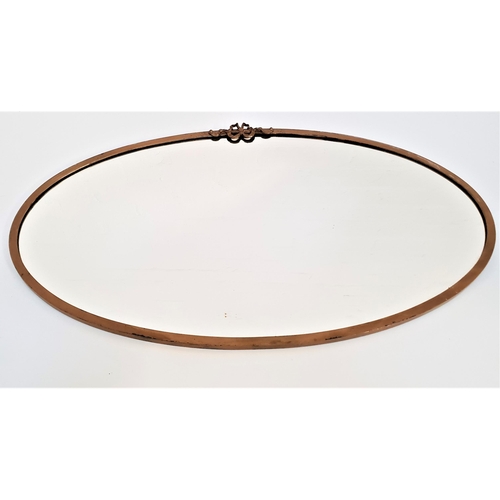 436 - METAL FRAME OVAL WALL MIRROR
surmounted with a bow, with a bevelled oval plate, 75cm wide