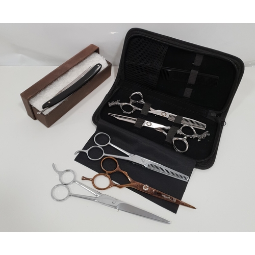 231 - THREE PAIRS OF HAIRDRESSER'S SCISSORS AND TWO PAIRS OF HAIR THINNERS
including a pair of each by Sha... 